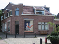 833646 Gezicht op het hoekpand Zacharias Jansenstraat 15 te Utrecht, met in het zijraam een muurreclame van de ...